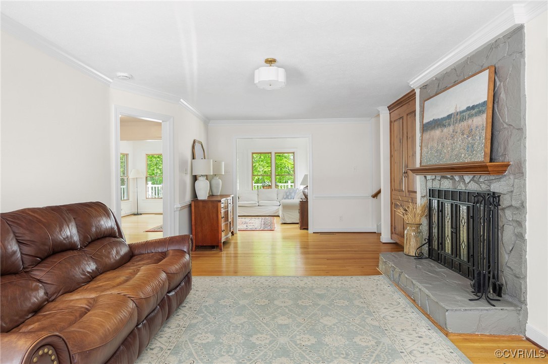 3001 Winterfield Road Midlothian, VA 23113 - Photo 9 of 50 a living room with furniture and a fireplace