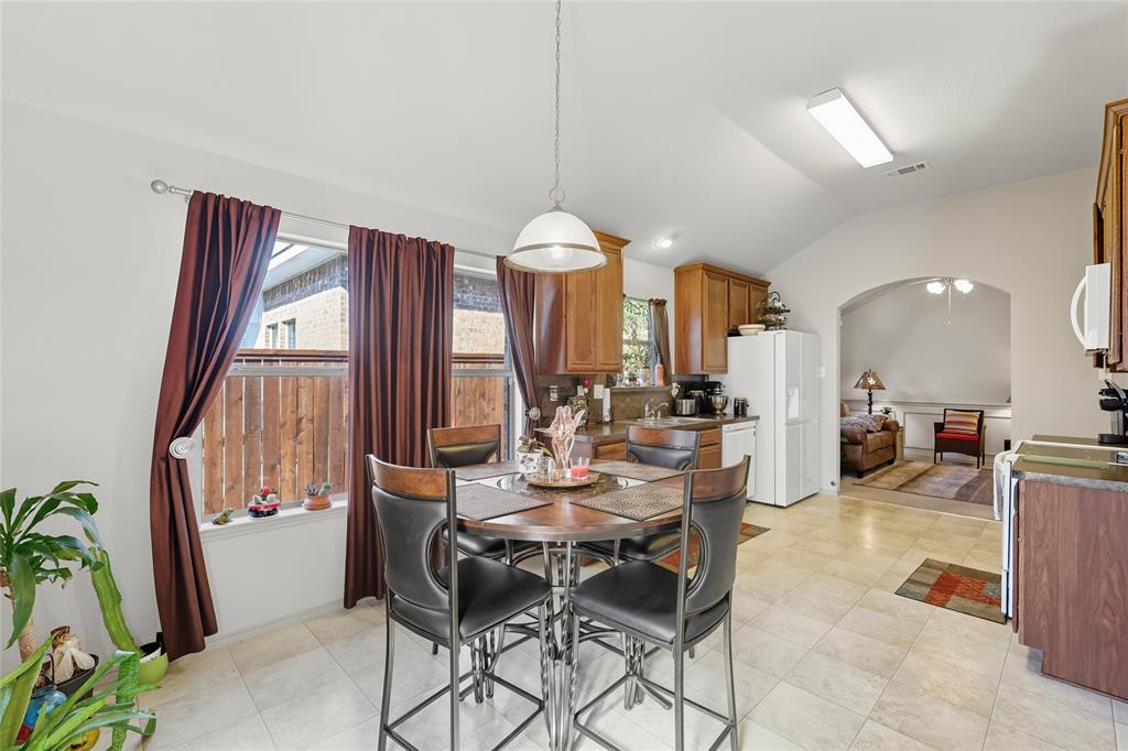 2708 Stockton Street Denton, TX 76209 - Photo 15 of 40 a view of a dining room with furniture and window