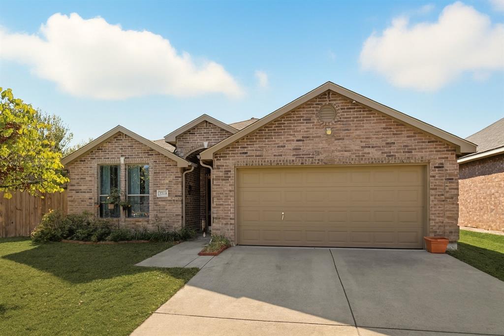 2708 Stockton Street Denton, TX 76209 - Photo 2 of 40 a front view of a house with garden