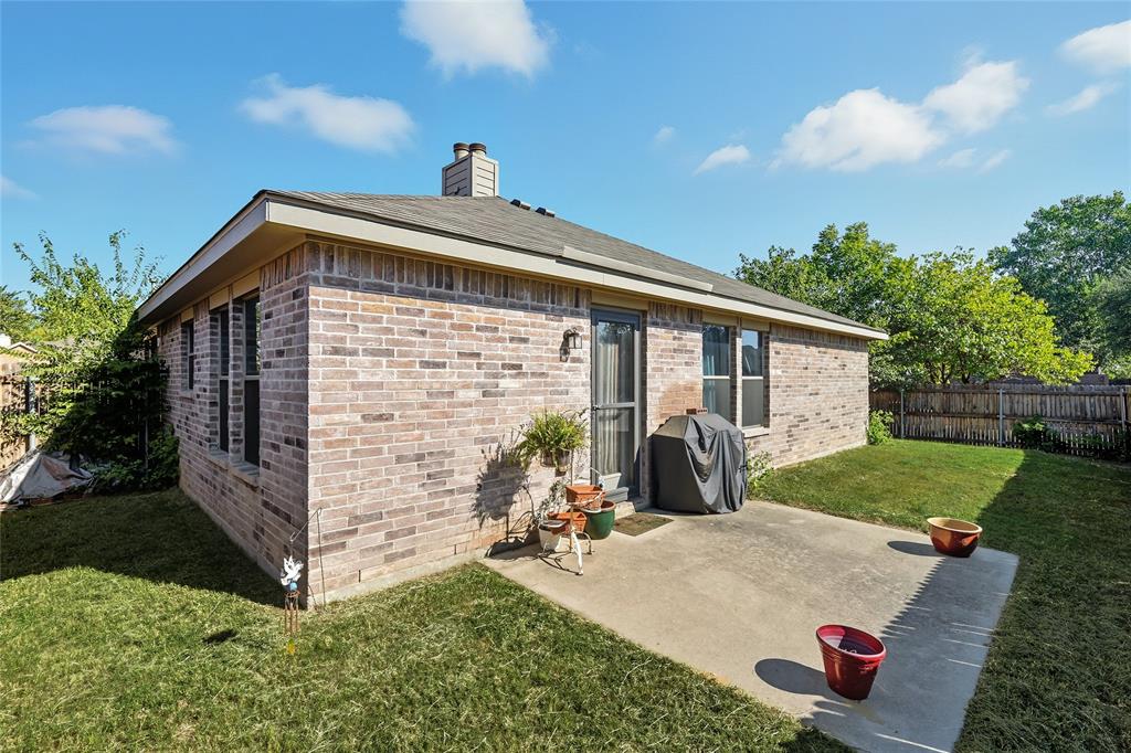 2708 Stockton Street Denton, TX 76209 - Photo 28 of 40 a front view of a house with garden