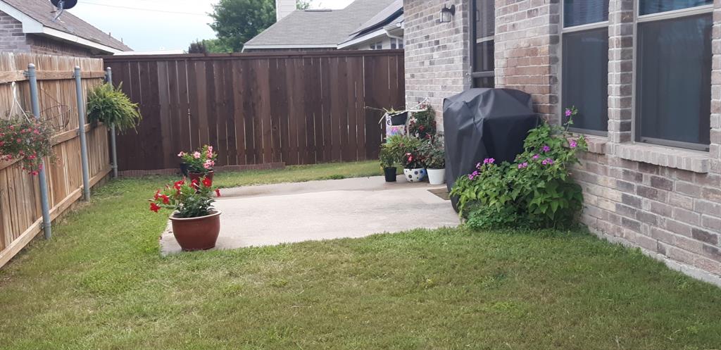 2708 Stockton Street Denton, TX 76209 - Photo 31 of 40 a view of a backyard with barn and plants