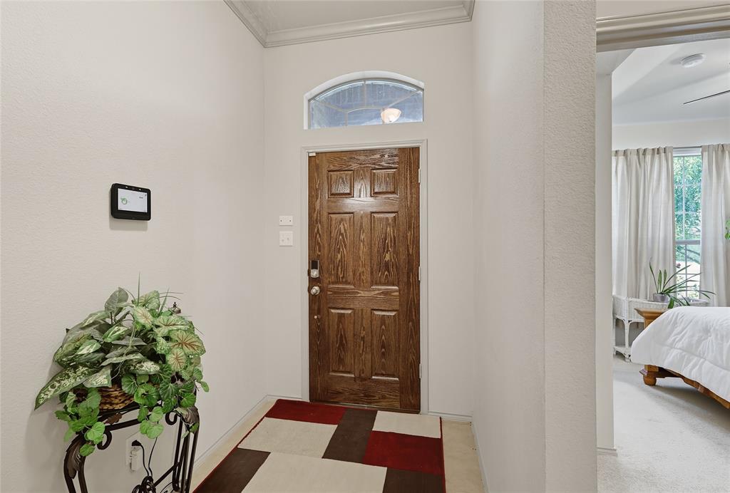 2708 Stockton Street Denton, TX 76209 - Photo 4 of 40 a view of front door with a potted plant