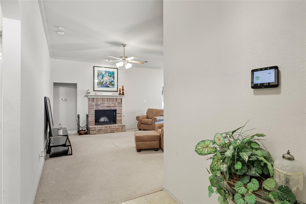 2708 Stockton Street Denton, TX 76209 - Photo 5 of 40 a living room with furniture and a fireplace