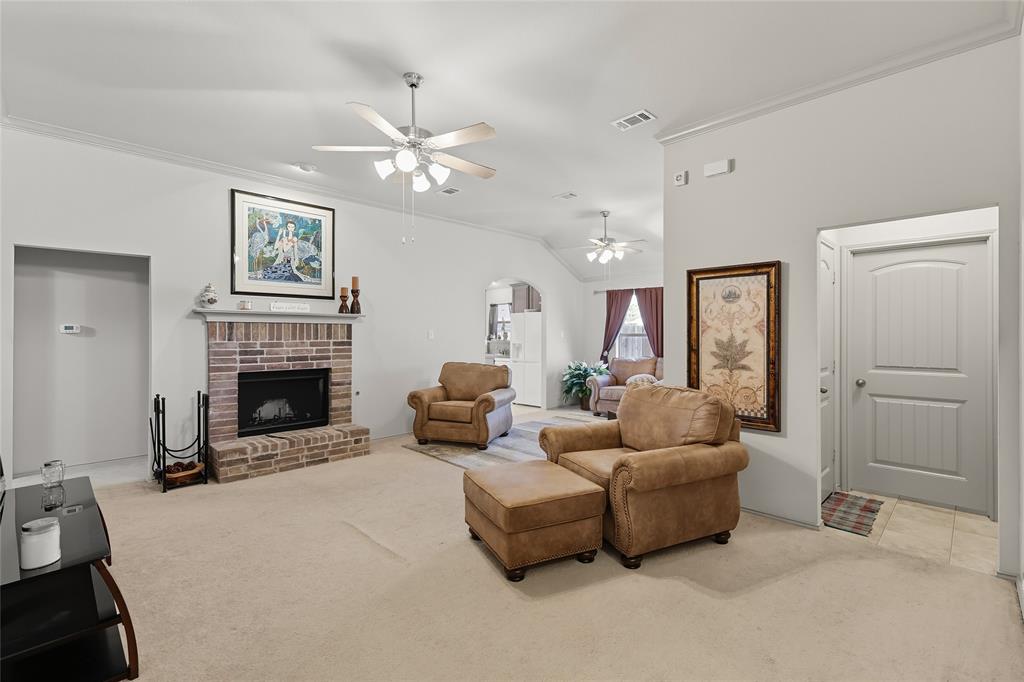 2708 Stockton Street Denton, TX 76209 - Photo 7 of 40 a living room with furniture and a fireplace