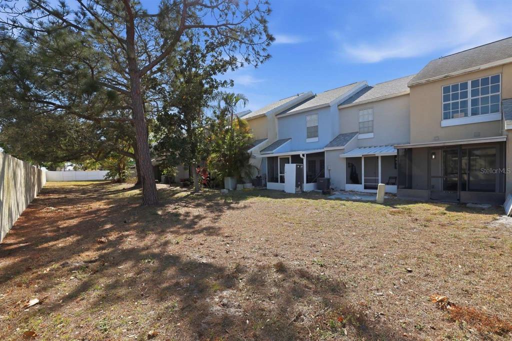 6600 121st Avenue, Unit 3 Largo, FL 33773 - Photo 27 of 27 a front view of a house with a yard