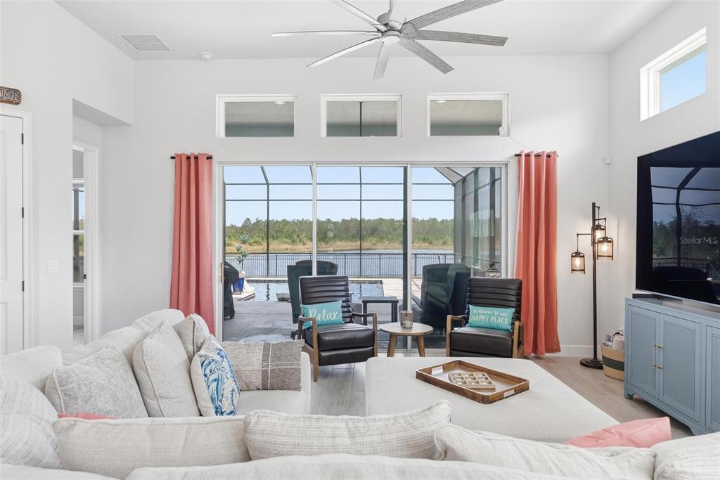 270 Azure Mist Way Daytona Beach, FL 32124 - Photo 11 of 71 a living room with furniture and wooden floor