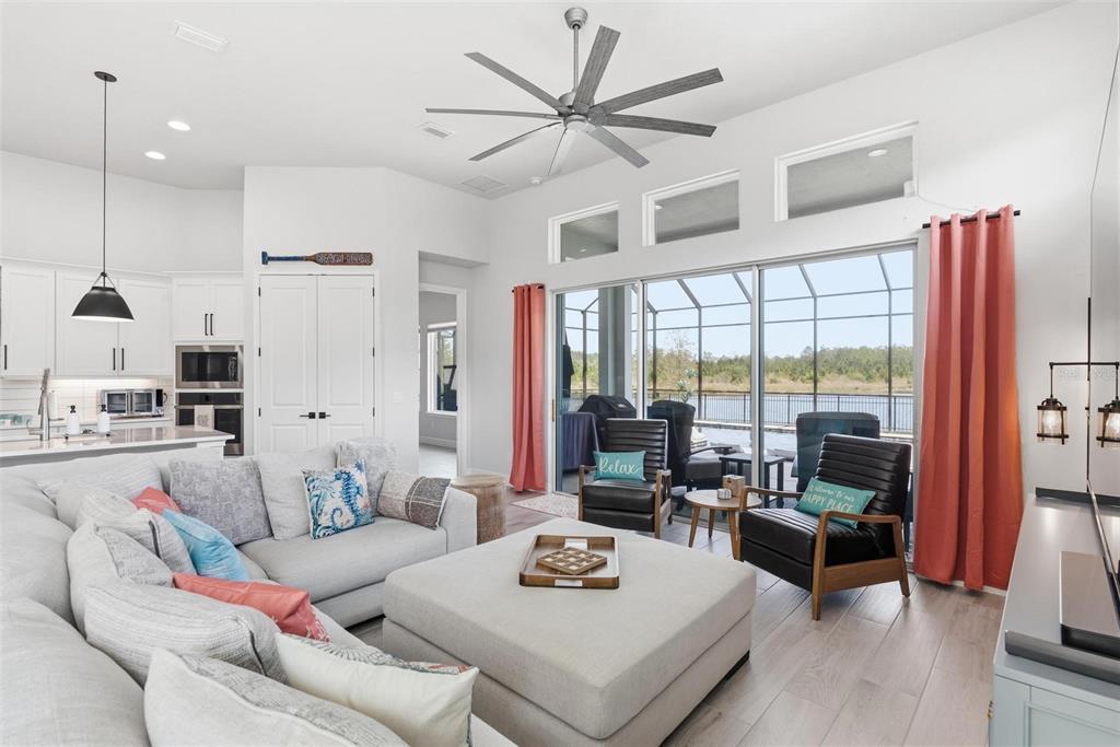 270 Azure Mist Way Daytona Beach, FL 32124 - Photo 12 of 71 a living room with furniture and a large window