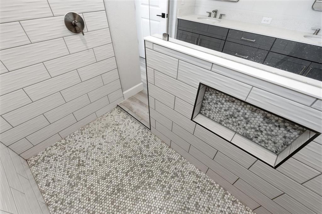 270 Azure Mist Way Daytona Beach, FL 32124 - Photo 34 of 71 a bathroom with a shower