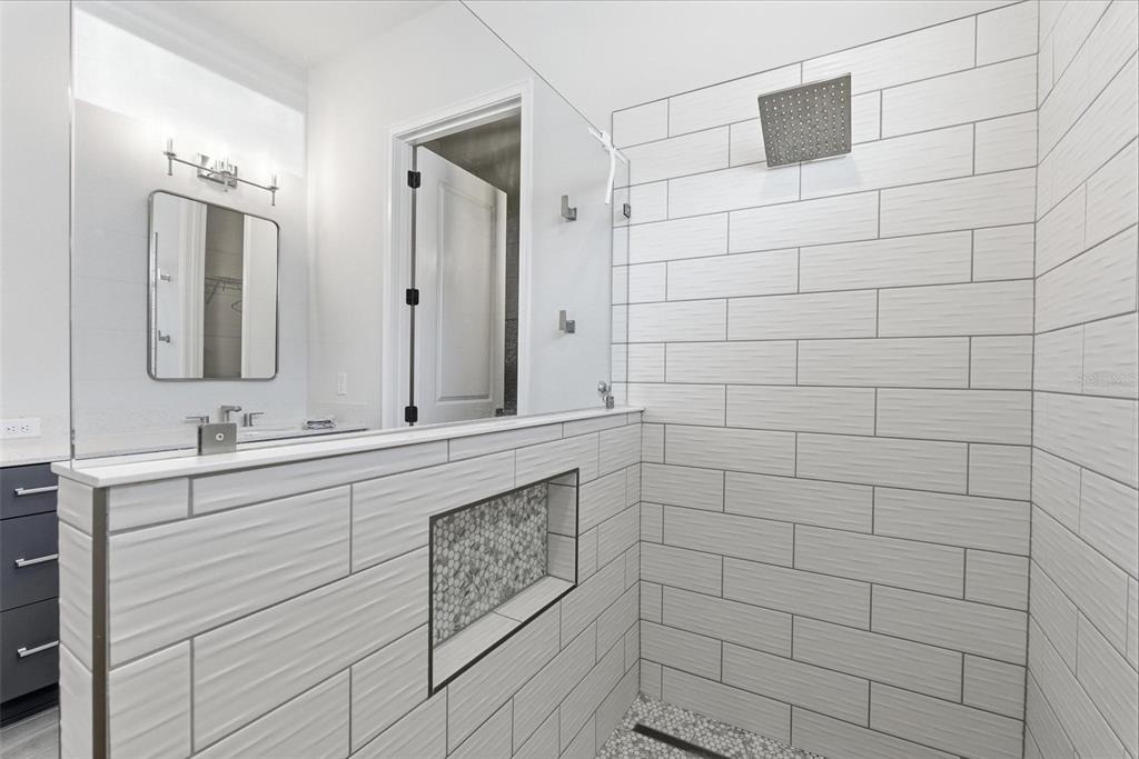 270 Azure Mist Way Daytona Beach, FL 32124 - Photo 35 of 71 a bathroom with a sink and a mirror