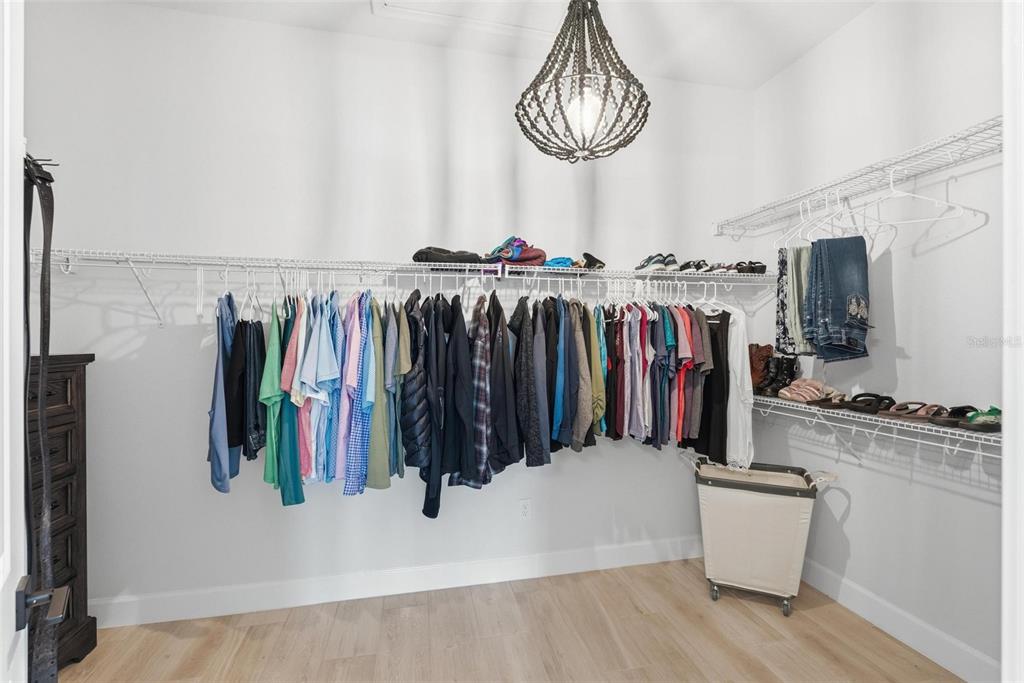 270 Azure Mist Way Daytona Beach, FL 32124 - Photo 36 of 71 a view of walk in closet with clothes