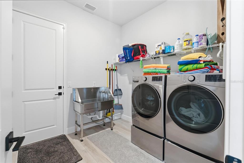 270 Azure Mist Way Daytona Beach, FL 32124 - Photo 49 of 71 a utility room with dryer and washer