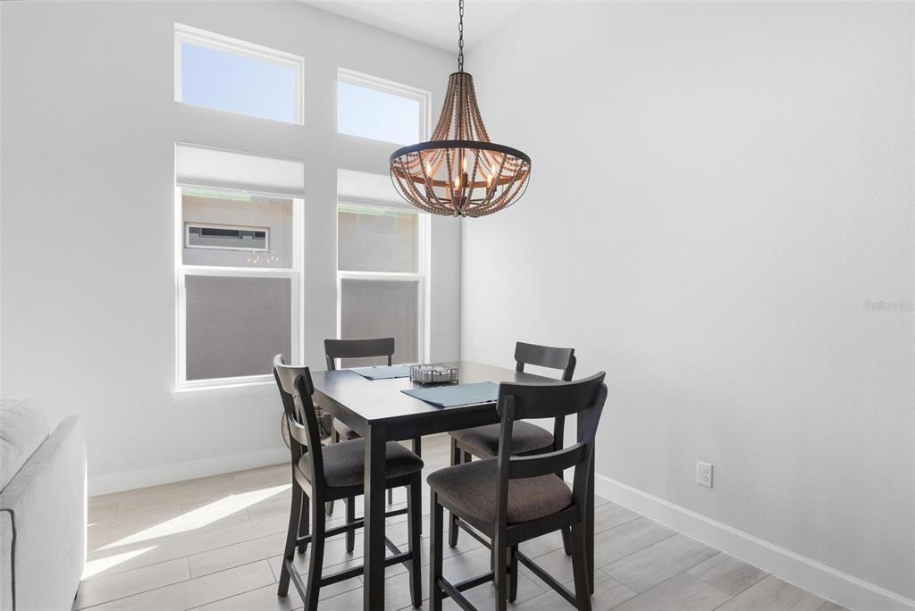 270 Azure Mist Way Daytona Beach, FL 32124 - Photo 57 of 71 a view of a dining room with furniture and window