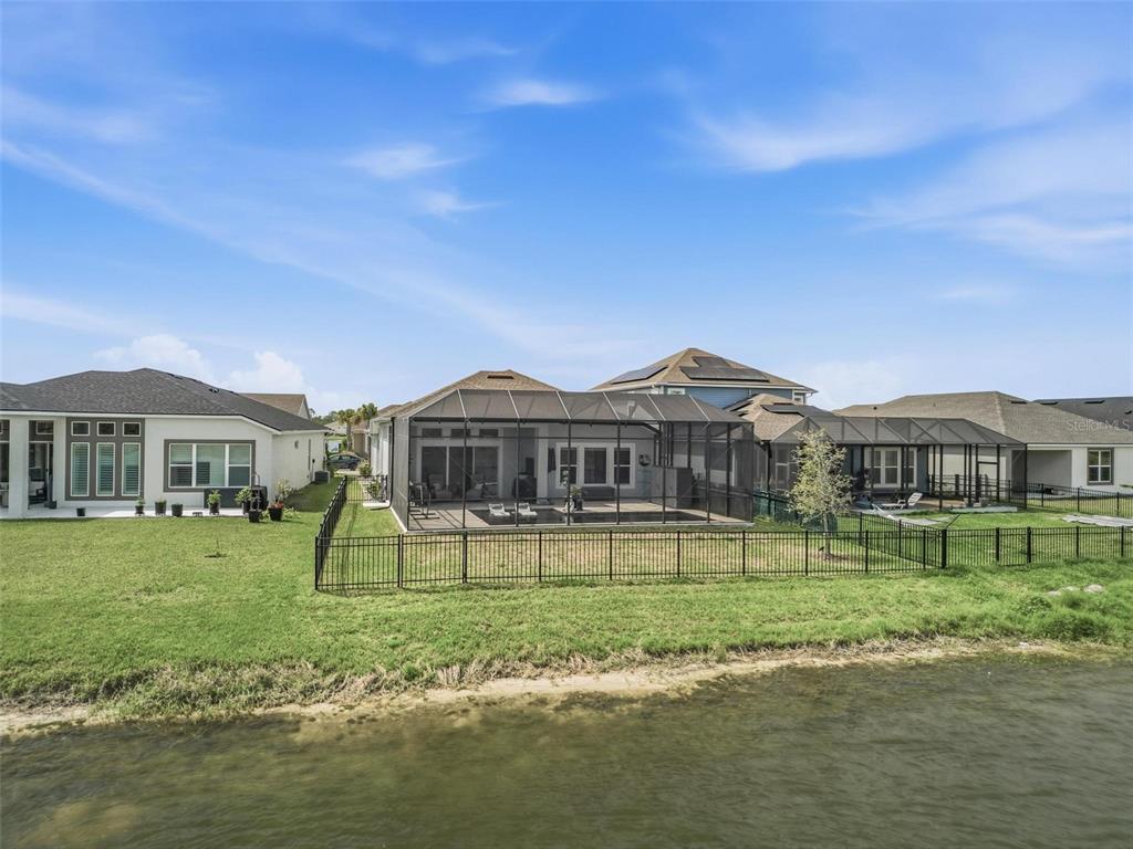 270 Azure Mist Way Daytona Beach, FL 32124 - Photo 62 of 71 a front view of a house with a yard