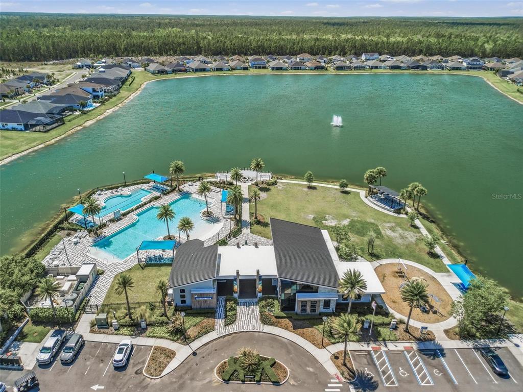 270 Azure Mist Way Daytona Beach, FL 32124 - Photo 65 of 71 an aerial view of a house with a lake view