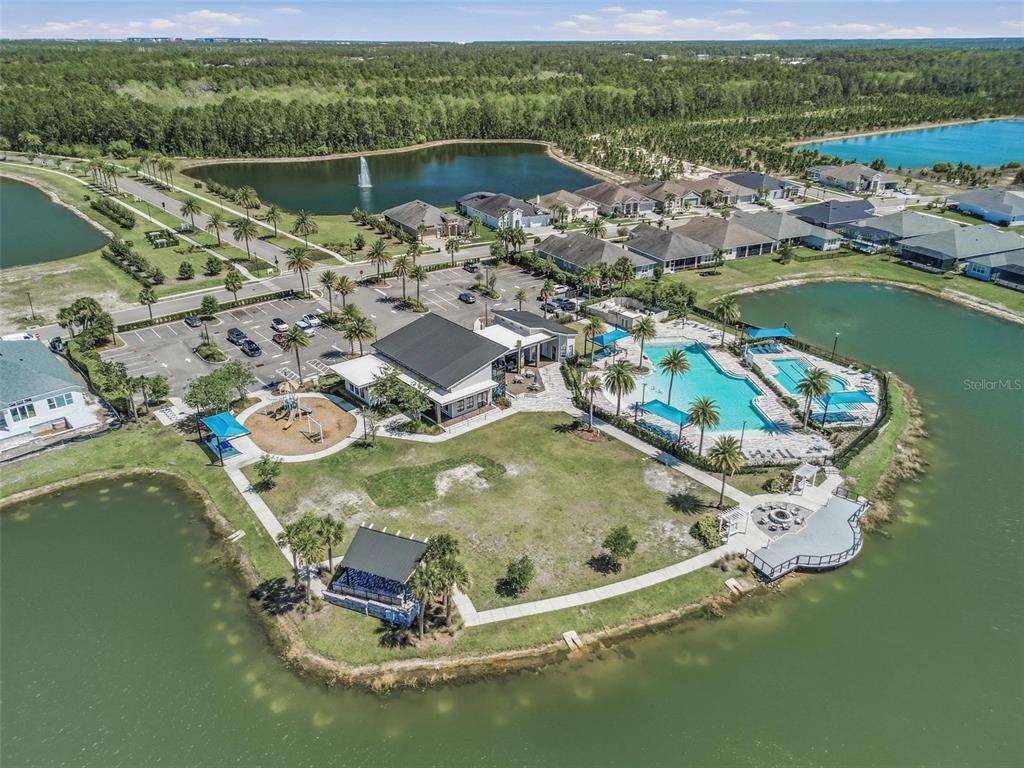 270 Azure Mist Way Daytona Beach, FL 32124 - Photo 66 of 71 an aerial view of a house with a lake view