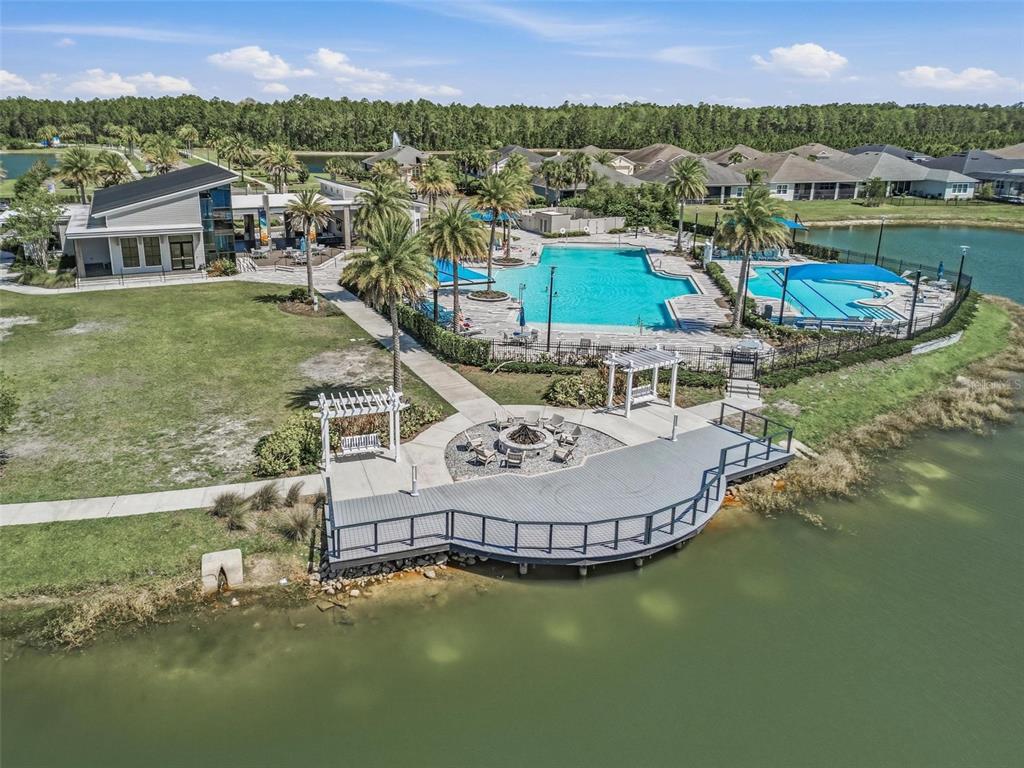 270 Azure Mist Way Daytona Beach, FL 32124 - Photo 70 of 71 a view of a lake with a mountain in the background