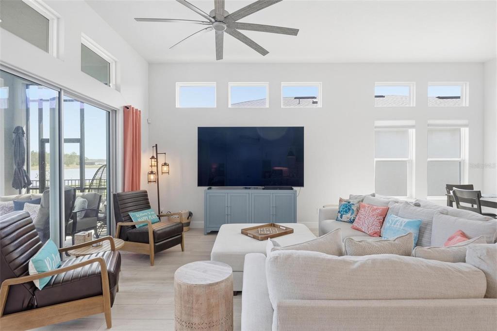 270 Azure Mist Way Daytona Beach, FL 32124 - Photo 9 of 71 a living room with furniture and a flat screen tv