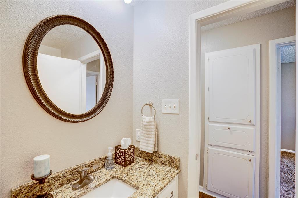 6028 Ridgecrest Drive Watauga, TX 76148 - Photo 28 of 40 a close view of a sink in a bathroom