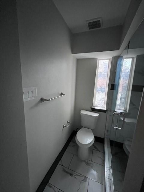 7734 Meadow Road, Unit 117 Dallas, TX 75230 - Photo 10 of 15 Bathroom with a shower stall and marble finish flooring