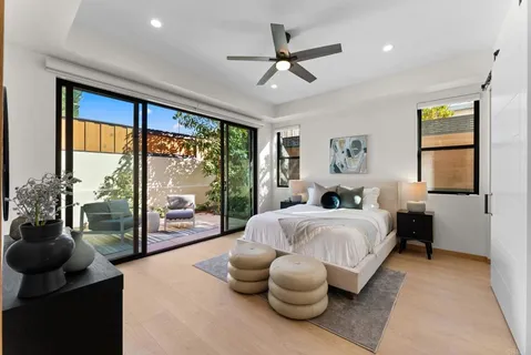 a bathroom with a shower sink and mirror