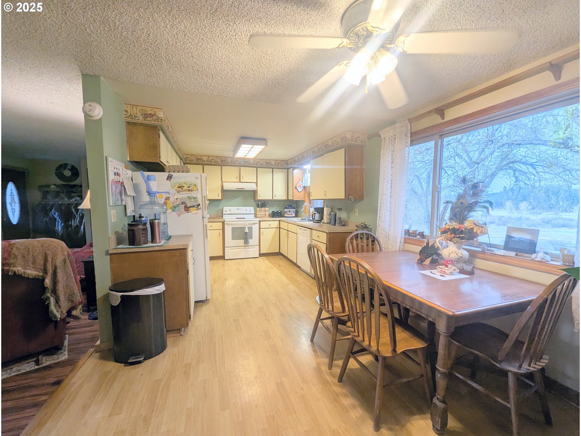 71564 Palmer Junction Road Elgin, OR 97827 - Photo 21 of 40 a view of a dining room with furniture and wooden floor