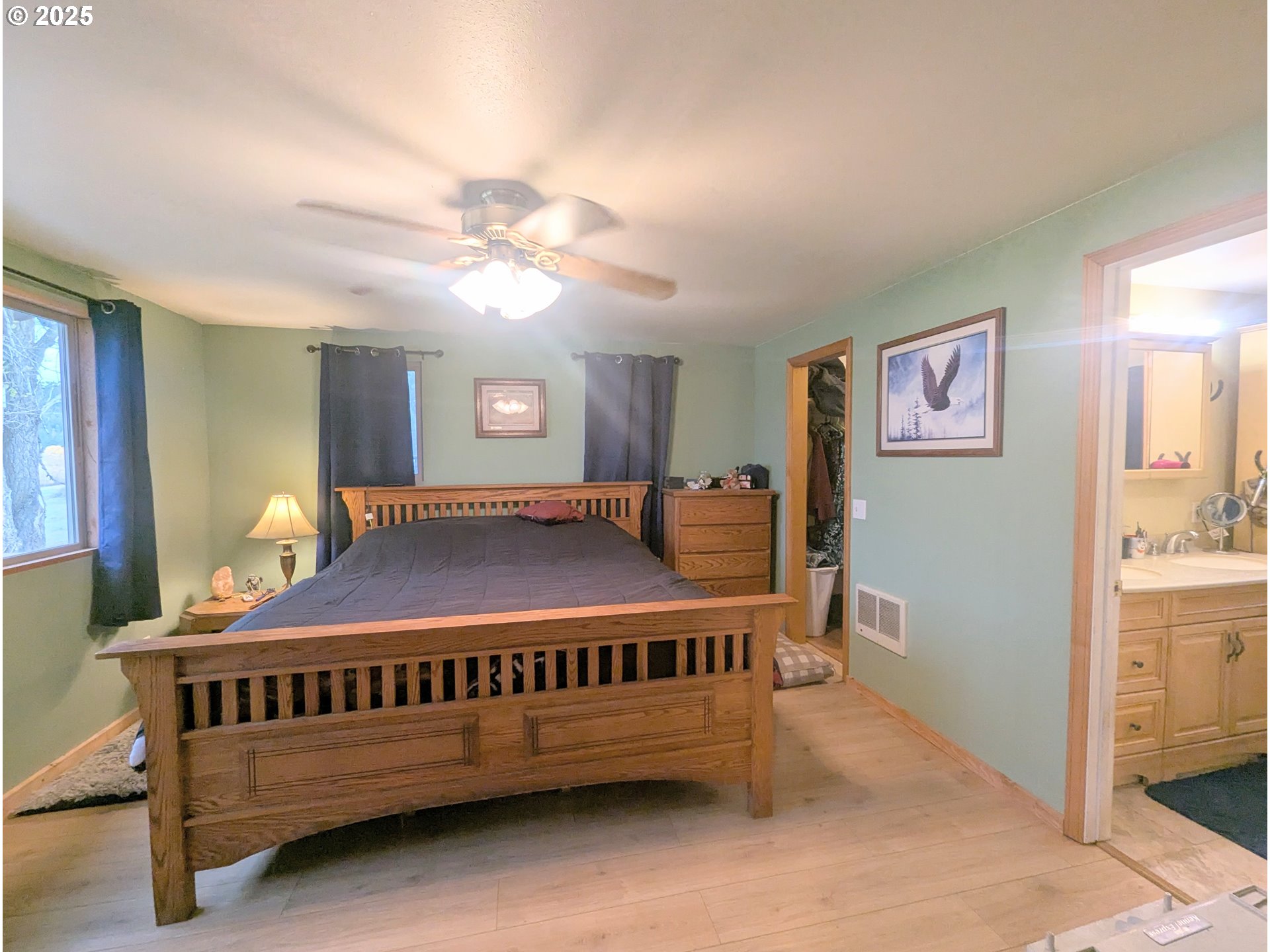 71564 Palmer Junction Road Elgin, OR 97827 - Photo 27 of 40 a bedroom with a bed and window
