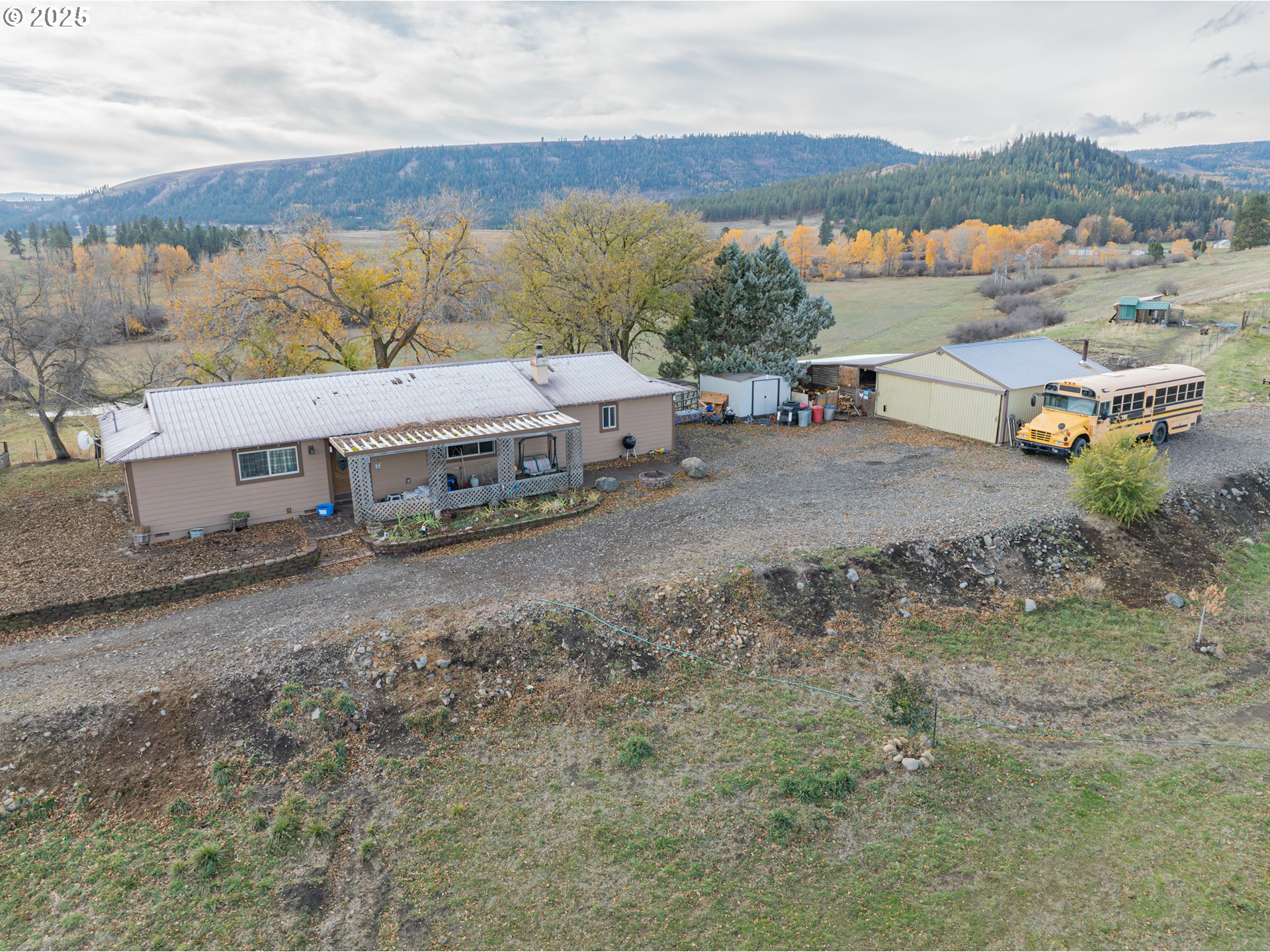 71564 Palmer Junction Road Elgin, OR 97827 - Photo 5 of 40 a view of a lake with a mountain
