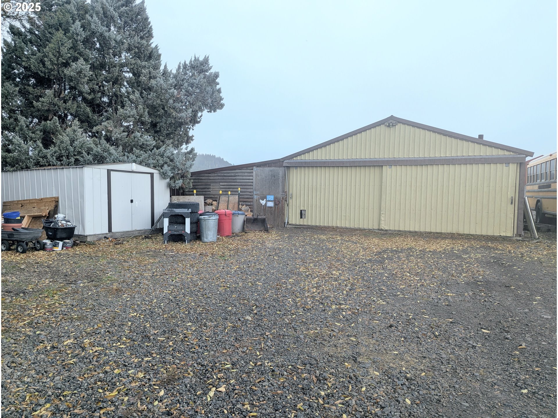 71564 Palmer Junction Road Elgin, OR 97827 - Photo 6 of 40 a view of garage and small cabin