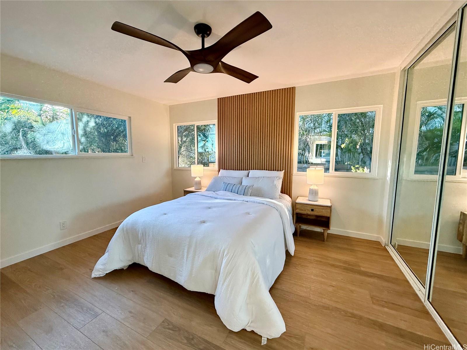 92-1274 Palahia Street Kapolei, HI 96707 - Photo 11 of 11 a bedroom with a bed and a large window