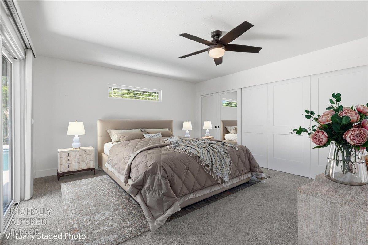 4849 Alexon Way Carmichael, CA 95608 - Photo 32 of 50 a bedroom with a bed and a potted plant