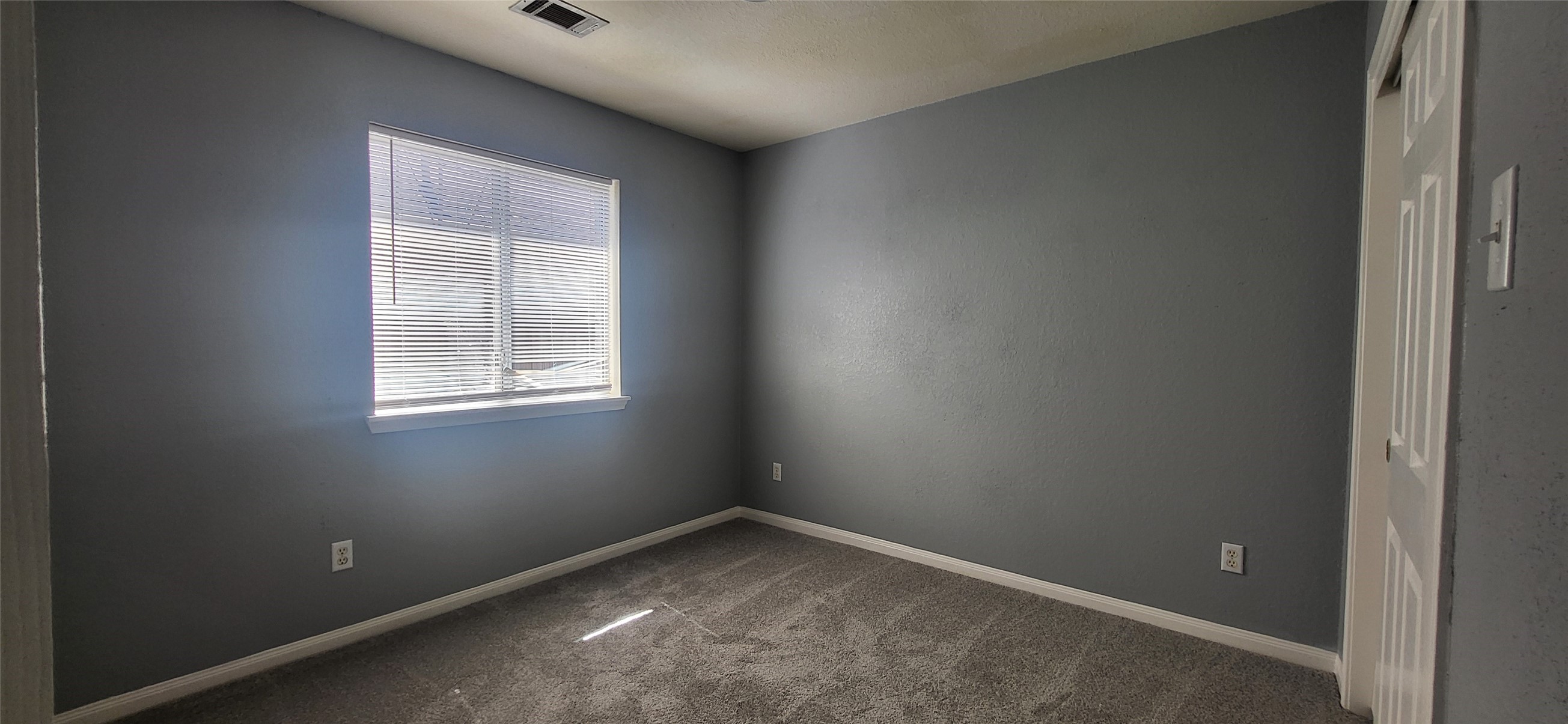 24022 Rockygate Drive Spring, TX 77373 - Photo 9 of 12 an empty room with a window