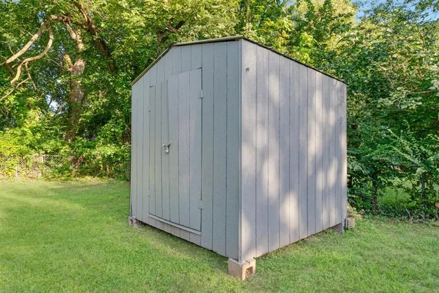 a view of backyard with green space