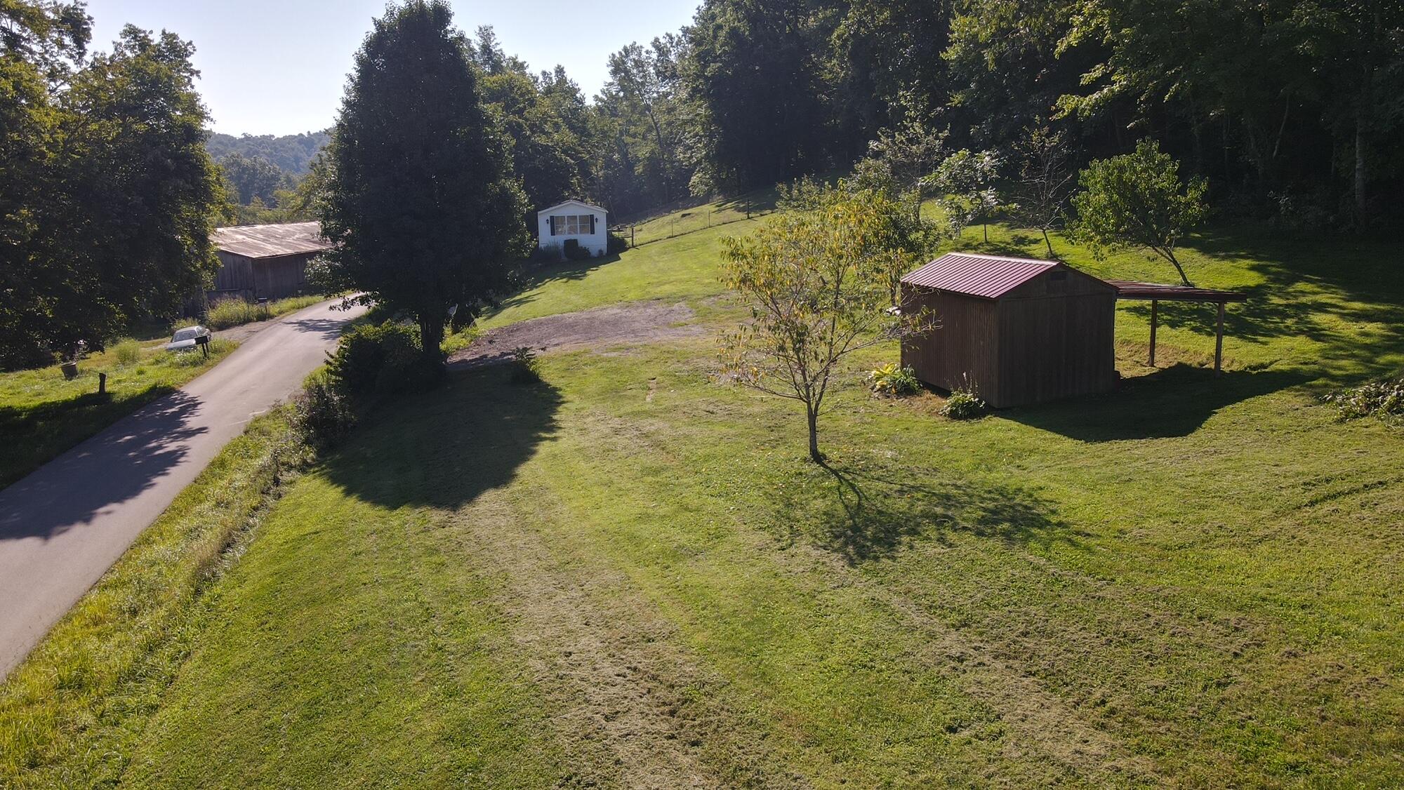 395 Reffitt Road Jeffersonville, KY 40337 - Photo 28 of 39 dji_fly_20220828_100536_326_166169554895