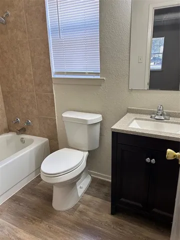 a bathroom with a sink and a toilet
