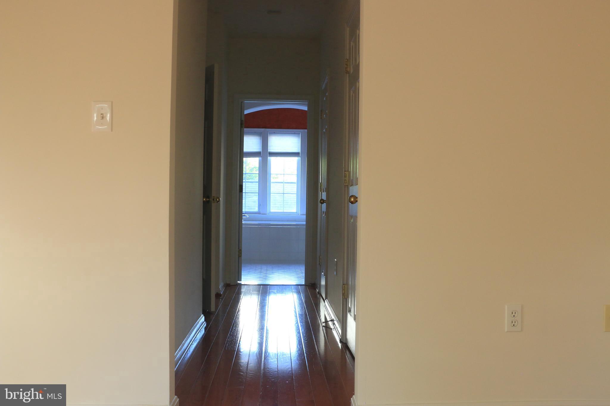 714 Ridgemont Avenue Rockville, MD 20850 - Photo 24 of 46 Master suite hall way w/ 3 closets (2 walks -in)