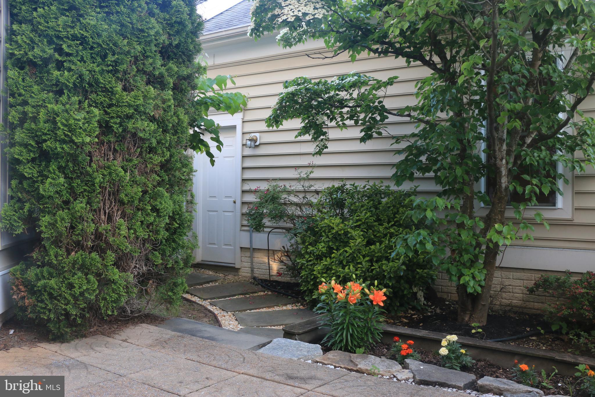 714 Ridgemont Avenue Rockville, MD 20850 - Photo 37 of 46 unwind patio back yard to 2 car garage