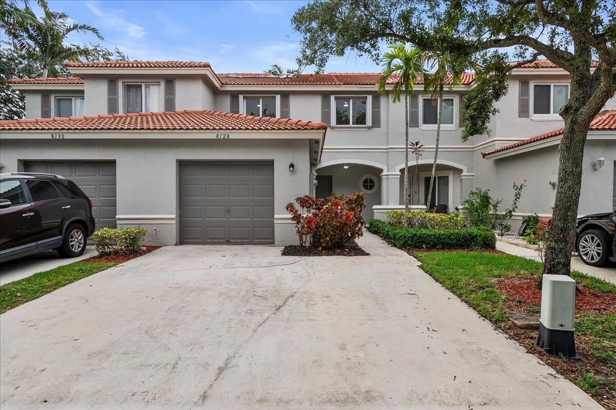 8128 Big Pine Way Riviera Beach, FL 33407 - Photo 1 of 37 Front View