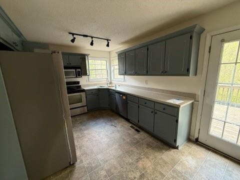 102 Twilight Court Jackson, GA 30233 - Photo 6 of 12 a kitchen with cabinets and window