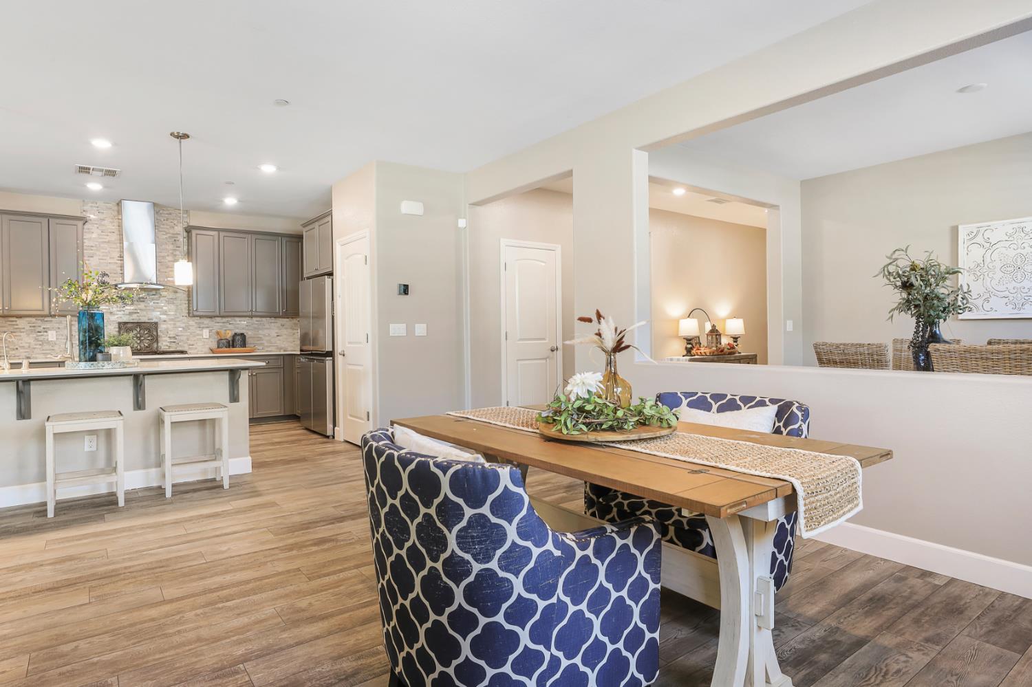 1676 Red Ribbons Lane Manteca, CA 95337 - Photo 11 of 33 a kitchen with a table and chairs in it