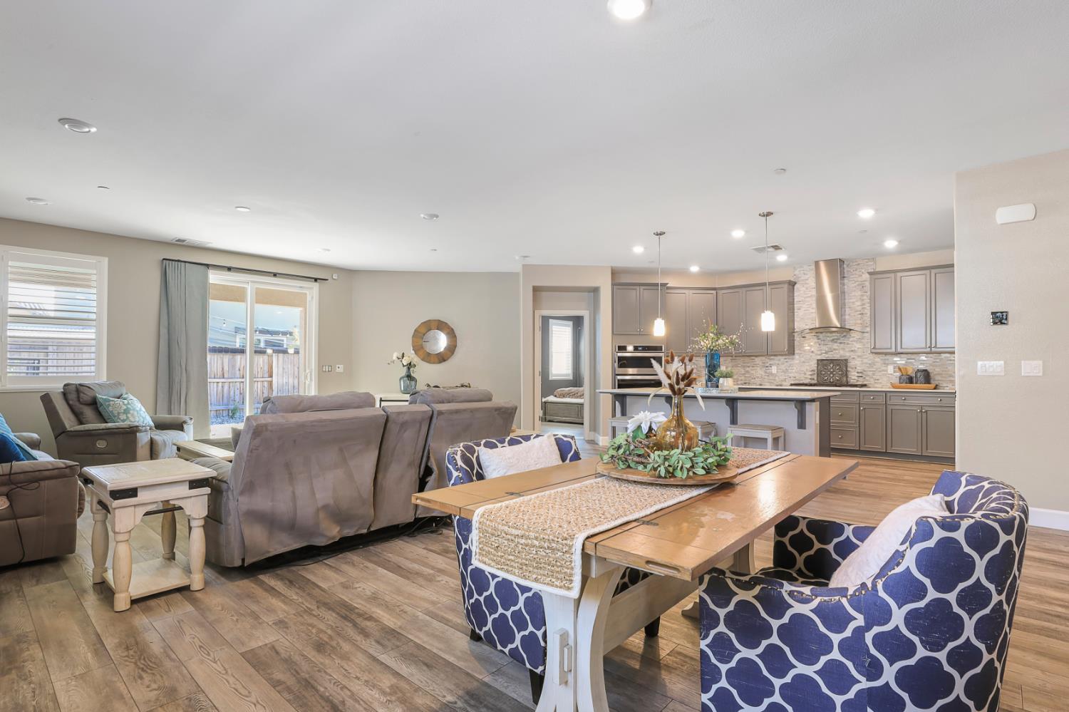 1676 Red Ribbons Lane Manteca, CA 95337 - Photo 12 of 33 a bed room with two bed and a large window