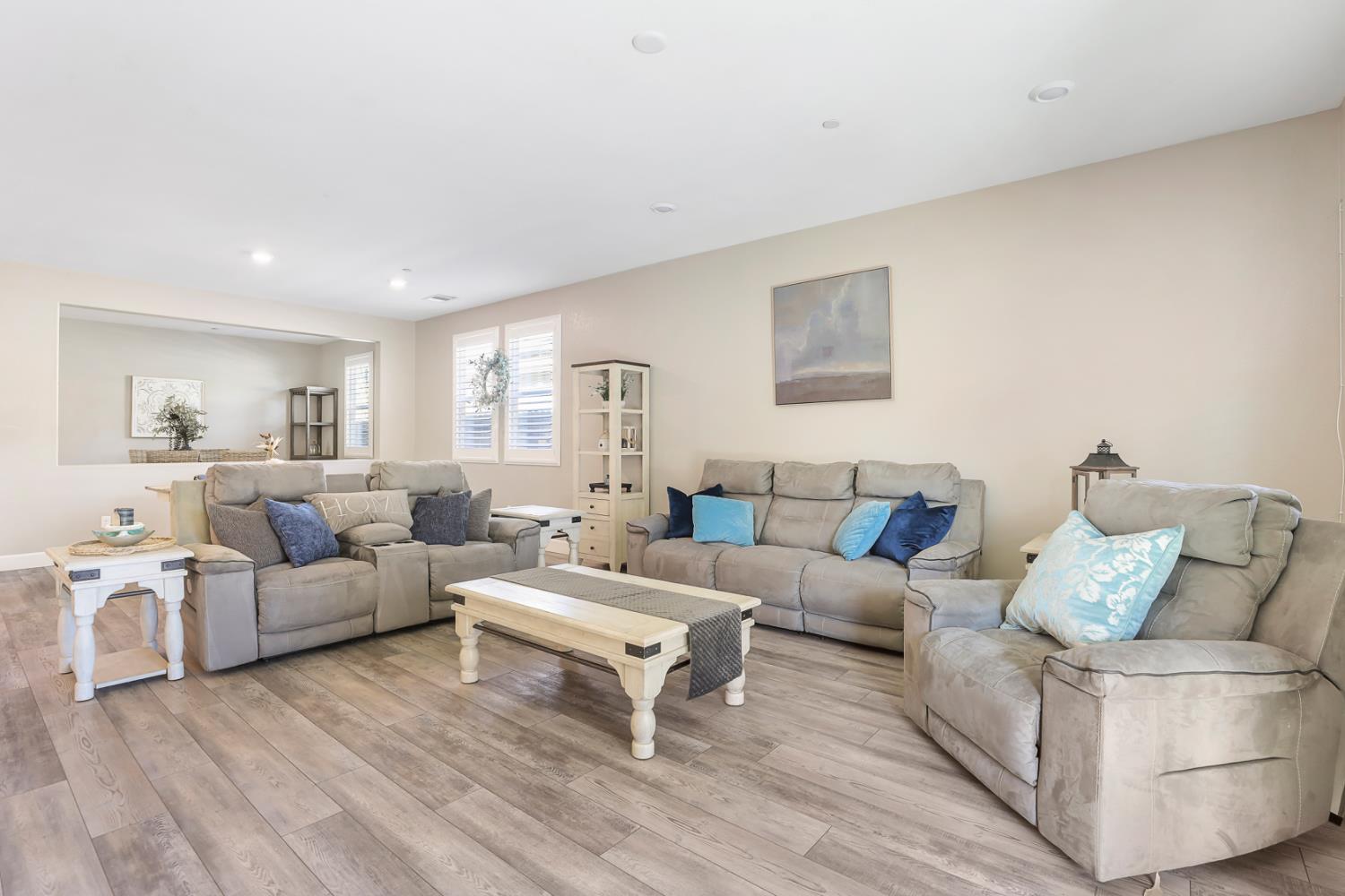 1676 Red Ribbons Lane Manteca, CA 95337 - Photo 18 of 33 a living room with furniture and a couch