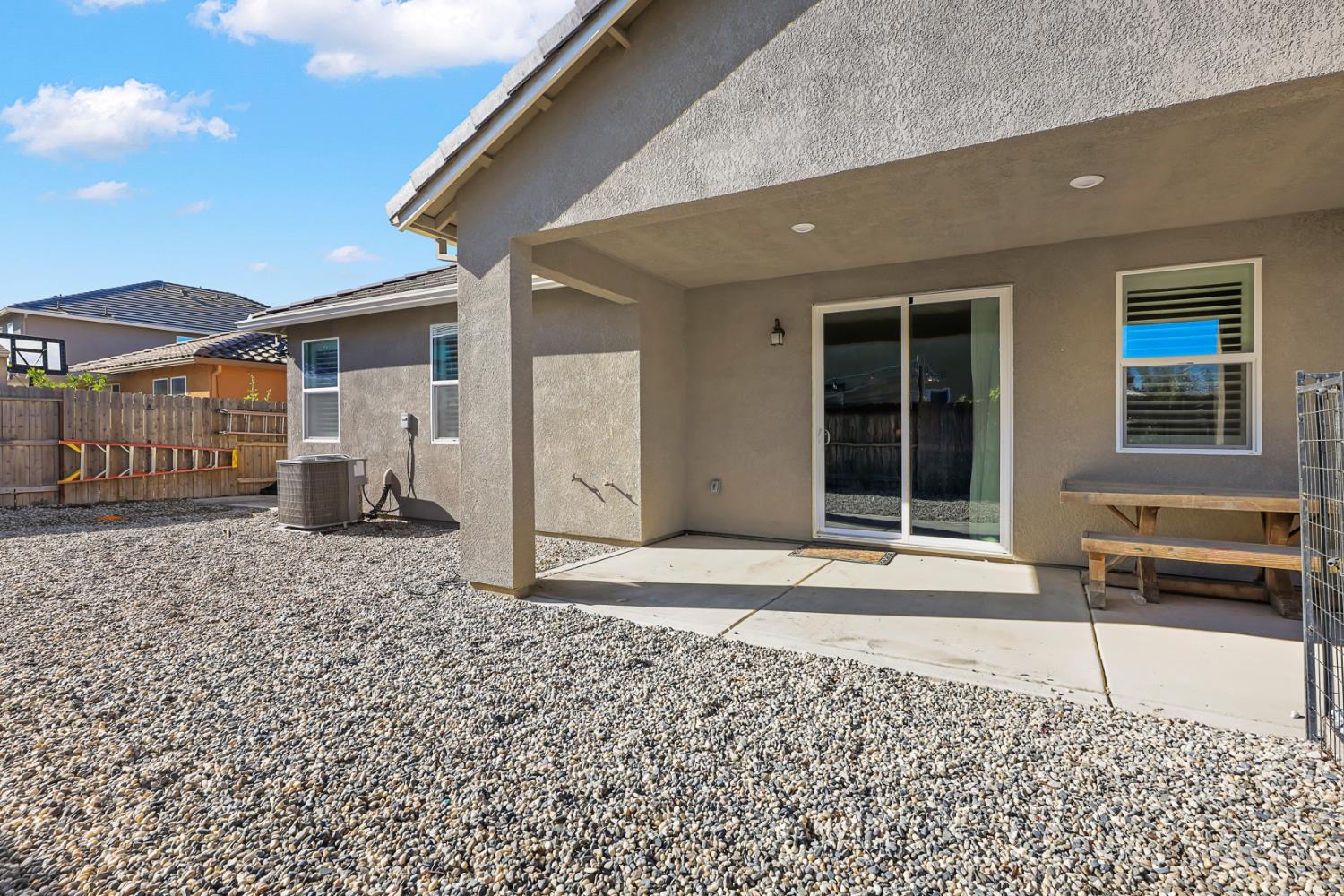 1676 Red Ribbons Lane Manteca, CA 95337 - Photo 26 of 33 a front view of a house with a yard