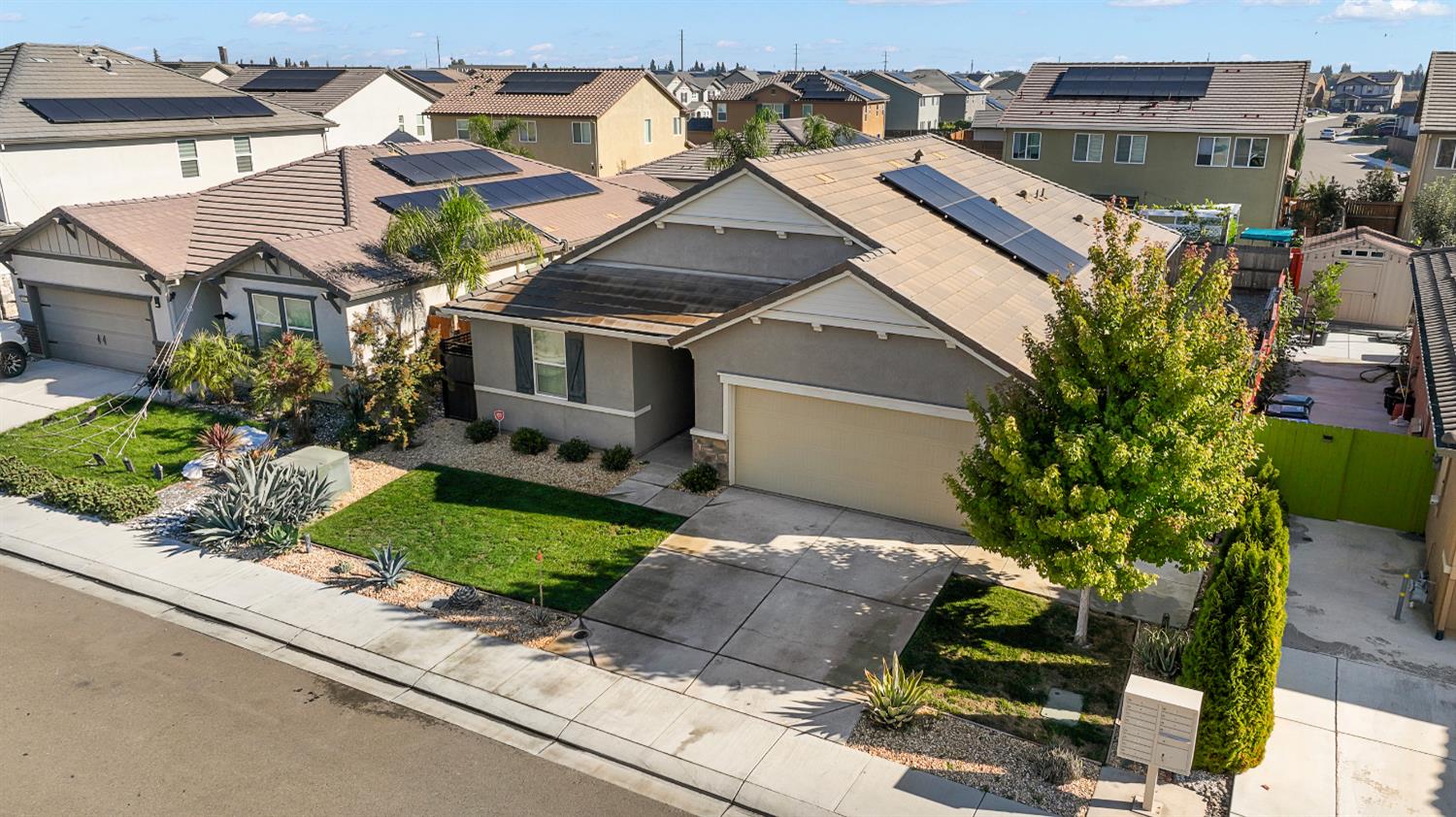 1676 Red Ribbons Lane Manteca, CA 95337 - Photo 3 of 33 an aerial view of a house