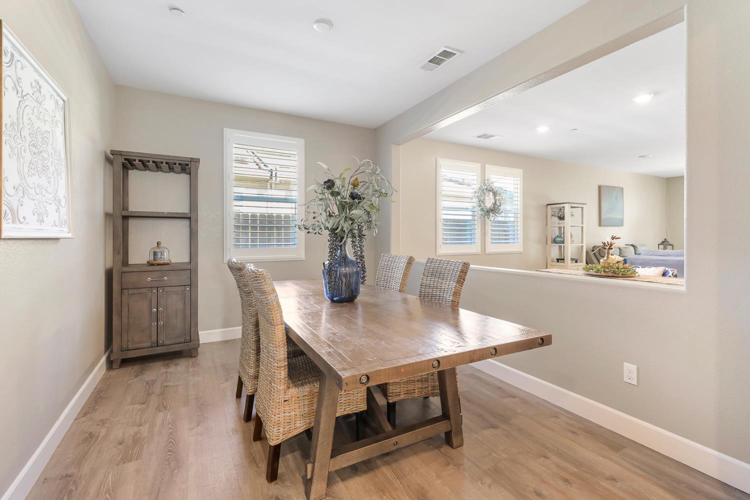 1676 Red Ribbons Lane Manteca, CA 95337 - Photo 9 of 33 a view of a dining room with furniture and window