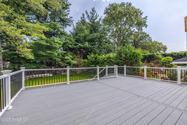 a view of a swimming pool with a backyard