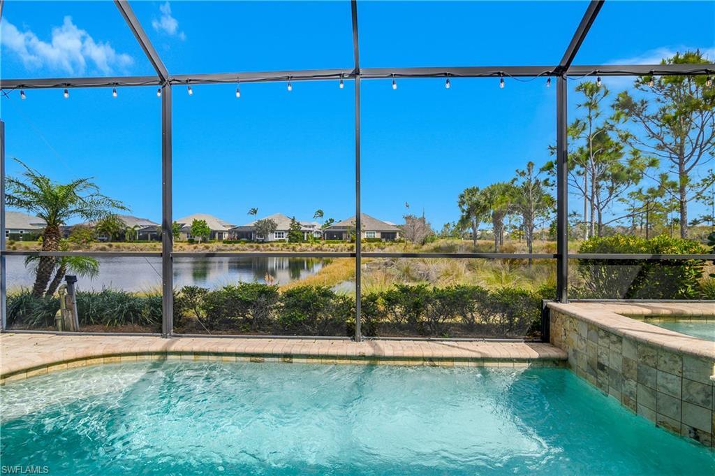6907 Cay Court Naples, FL 34113 - Photo 1 of 50 Pool and Spa with Water Views