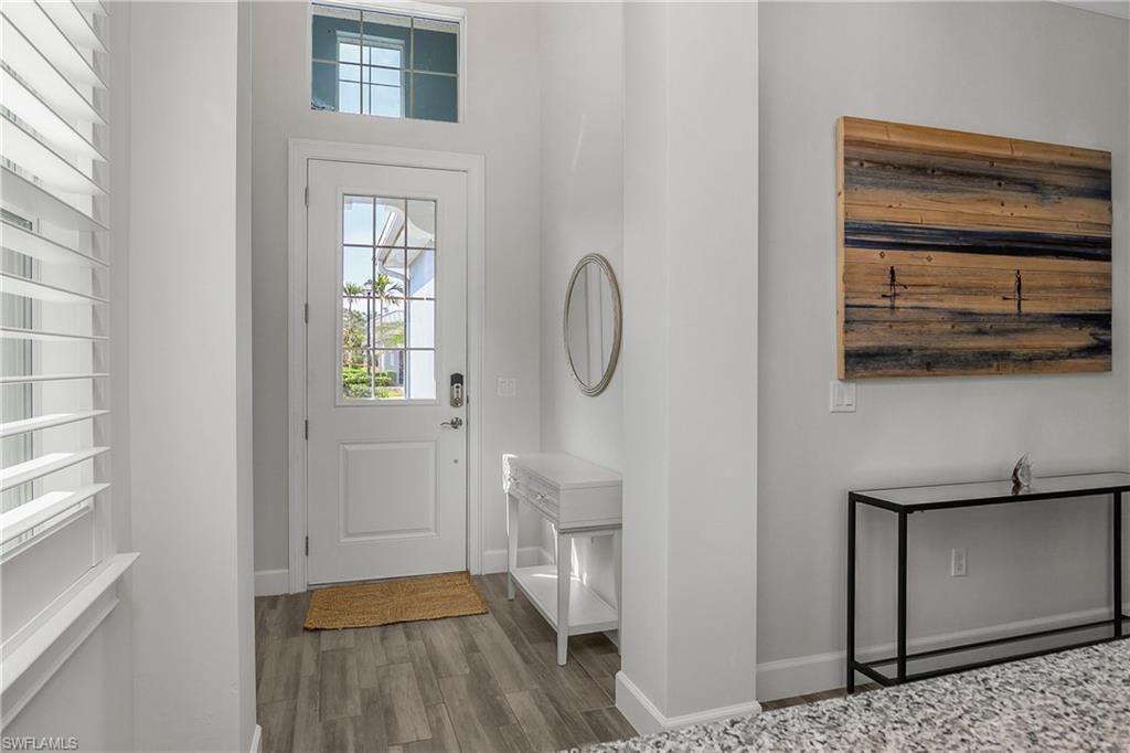6907 Cay Court Naples, FL 34113 - Photo 13 of 50 Entryway Foyer- Welcoming Entry