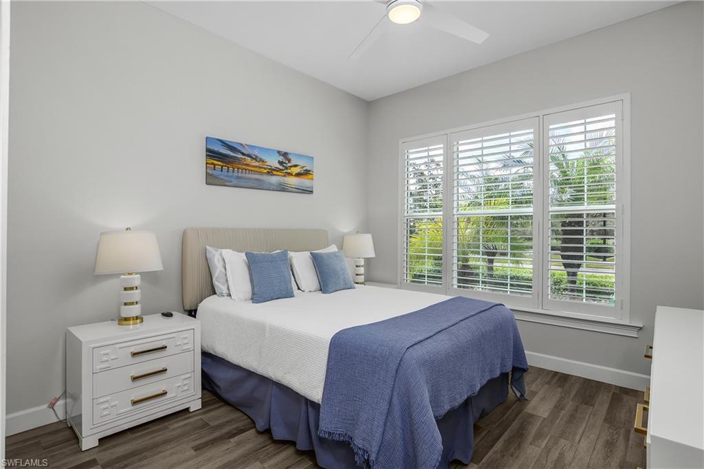 6907 Cay Court Naples, FL 34113 - Photo 17 of 50 Guest Bedroom with Tile- flooring and ceiling fan, Plantation Shutters
