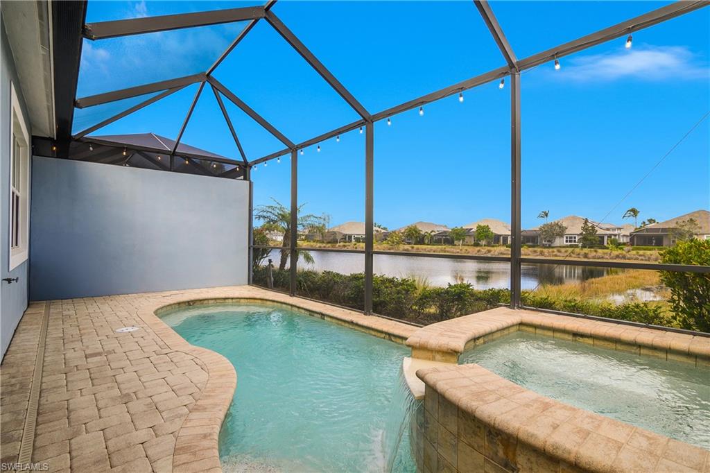 6907 Cay Court Naples, FL 34113 - Photo 29 of 50 Another shot of the Pool and Spa and Water Views