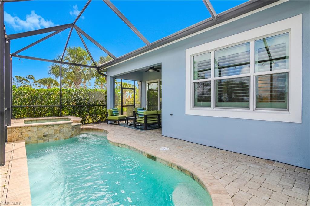 6907 Cay Court Naples, FL 34113 - Photo 33 of 50 Views of the outdoor seating area.